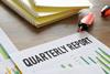 Quarterly,Report,Is,Shown,Using,A,Text