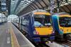 Image shows a Northern train and TransPennine Express train at Hull station_cropped