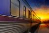 Train,Passing,By,In,Orange,Sunset