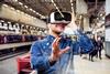 Man,Wearing,Virtual,Reality,Goggles,,Standing,At,Train,Station