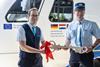 Pictured left is Arriva driver Björn Schoester handing over the train's ‘key’ to Belgian counterpart Gilles Dister (NMBS)_cropped
