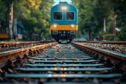 A freight train front on perspective as it moves down the track