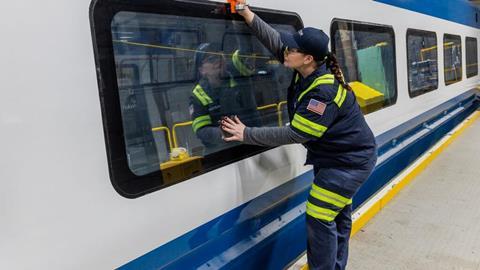 Alstom employee working on Amtrak NextGen Acela in Hornell compressed