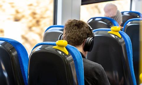 Image shows customer on-board a Northern train_cropped