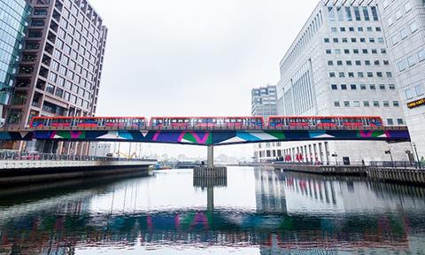 TfL Image - A DLR train crosses Middle Dock in Canary Wharf