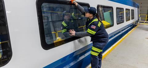 Alstom employee working on Amtrak NextGen Acela in Hornell compressed