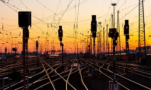 Railway,Tracks,At,A,Major,Train,Station,At,Sunset.