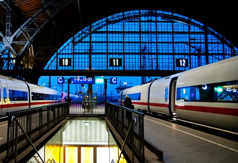 Leipzig,Train,Station,At,Night,With,Two,Speed,Trains,About