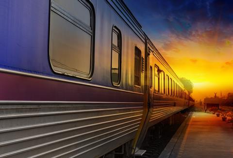 Train,Passing,By,In,Orange,Sunset