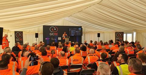 Sam announces funding round close to packed audience applause at GCRE demo day