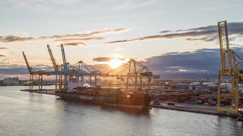 Aerial,Sunset,View,Of,The,Sea,Cargo,Port,And,Container